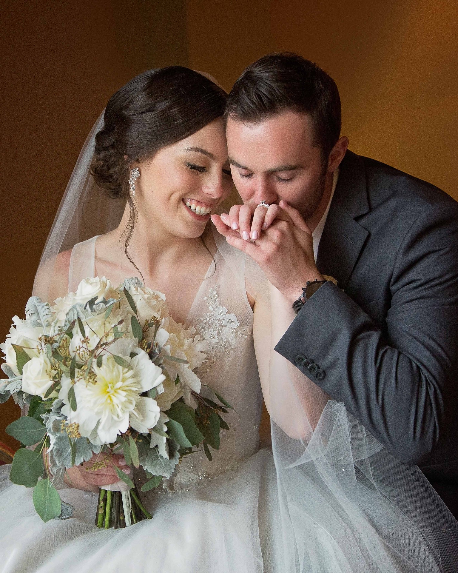 Bride close-up under a soft veil