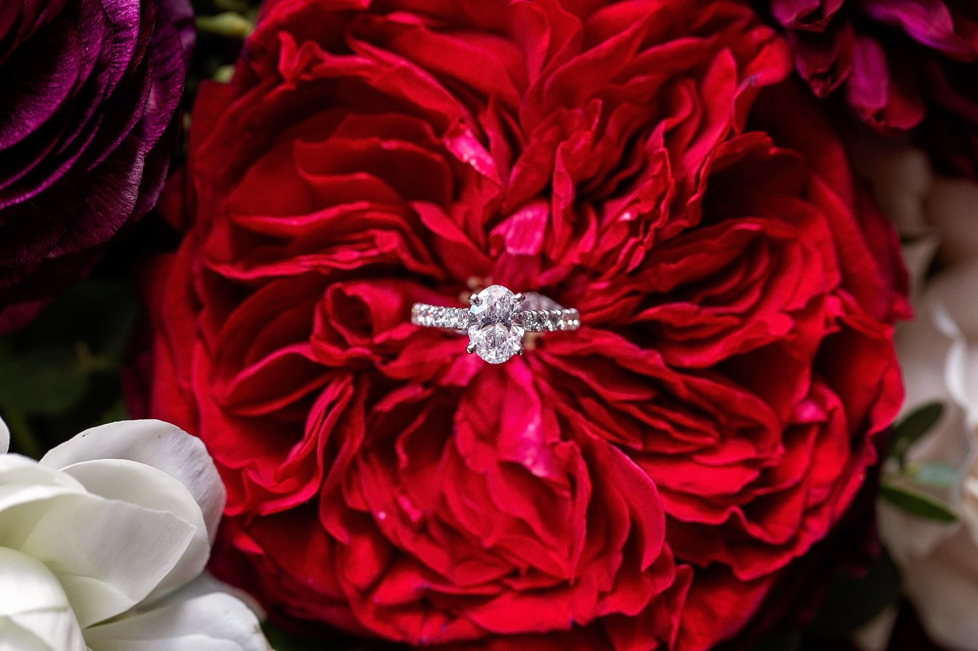 Engagement ring styled on strands of pearls