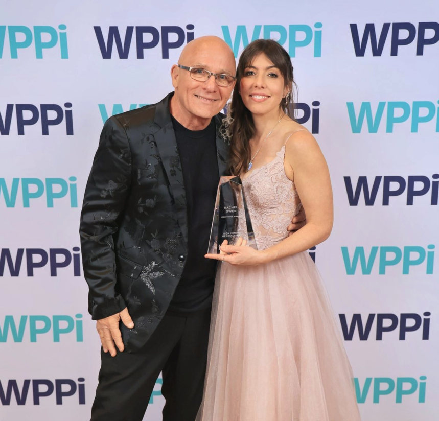Jeff and Rachel Owen at WPPI, Rachel holding her Honors of Excellence award